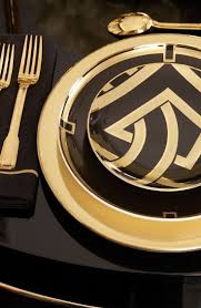 Black And Gold Dinner Plates A Black And Gold Art Deco Tablesetting From Ralph Lauren Home Epitomizes Opulence Bykoket Com Home Php Gold Art Deco Art Deco Deco