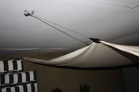 If you want to use a partly finished basement and cover the ceiling with something temporary until you can completely finish the space, consider. Drop Cloth Ceiling Let S Face The Music