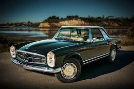 The perfect and classic color combination sets this car off. Dark Olive Mercedes Benz 280 Sl Pagoda Complete Restore Gtspirit
