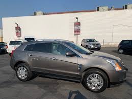 Image result for Mocha Steel 2011 Cadillac