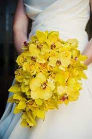 Yellow and white wedding bouquet idea with yellow orchids. Pin On Mary Fashion Noiva
