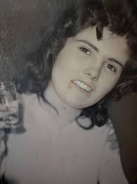 Can anyone help me with taking the stain off this picture of my late mother  please and maybe enhance the quality, thank you