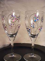 Painted Wine Glasses With Polka Dots And Swirls And Black Stem Etsy In 2021 Unique Painted Wine Glasses Wine Glass Crafts Painted Wine Glasses