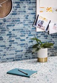Mosaic backsplashes and shower mosaics make great projects, and with a little thought, it is possible to come up with designs, even figurative designs (pictures), which integrate visually with existing tiling and decor. Kitchenbacksplash Tile Mosaic Glass Tile Mosaic Backsplash And Terrazzo Counte Blue Backsplash Kitchen Glass Backsplash Kitchen Glass Mosaic Tile Backsplash