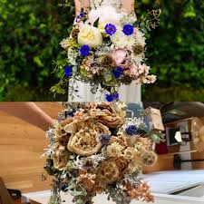 A mourner holds her hands together in prayer as. Hold Bunch Flowers Upside Down Artificial Wedding Rose Flowers White Holding Bouquet When It S Time To Move On Artificial Flowers