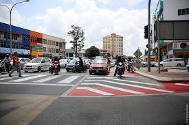 Between thai drivers that don't slow down as someone is trying to cross or pedestrians not using. Malaysia