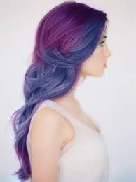 The cool shades will enhance the cool base of your a monochromatic black or white outfit will look compellingly mysterious and romantic with luscious purple hair. Blue Purple Hair Long Waves In Soft Plum And Indigo Hairstyles Weekly