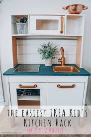 How i refinished our duktig play kitchen for free with paints i already had on hand and turned it into a modern kitchen. Ikea Kid S Kitchen Hack Collectively Casey