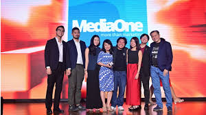 MediaOne Marketing team receiving international digital marketing award Singapore