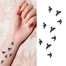 A flock of birds in flight is a popular choice, as are several birds perched on a wire or tree branch. Wrist Flash Tattoo Fake Tattoo Birds Design Waterproof Temporary Tattoo Sticker For Body Art Women Flesh Tattoos Buy At The Price Of 0 37 In Aliexpress Com Imall Com