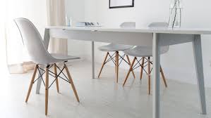 Crafted of hardwood solids, engineered wood, and veneers, the table features turned legs. Aver Grey And White Extending And Eames Dining Set Eames Style Dining Chair Eames Dining Eames Dining Chair