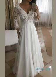 This minimalistic gown is made from stretchy crepe and delicate soft lace. H0896 Sexy Semi Sheer Lace Top Tulle Bottom Skirt Wedding Dress