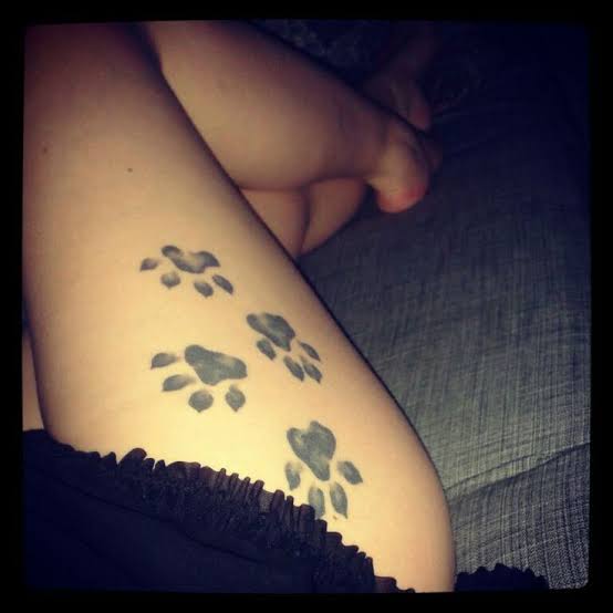 Paw Print Tattoo on Thigh | Paw tattoo on leg, Paw tattoo on thigh, Dog paw