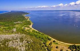 The curonian spit is a unique and vulnerable, sandy and wooded cultural landscape on a coastal spit which features small curonian lagoon. Discover Neringa Why Explore Lithuania S Magnificent Curonian Spit