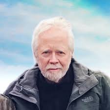 What stores were at the Mid Valley Mall when it opened?