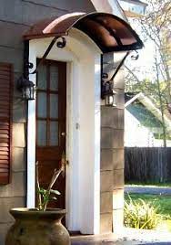 The Copper Eyebrow Awning With The Single S Scrolls In Martinez Ga Awning Over Door Door Awnings Custom Awnings