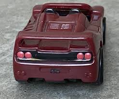 Image result for Rouge Ferrari 1999 DAF