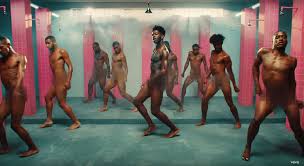 Lil Nas X dances naked in prison shower in Industry Baby video