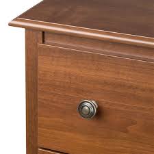 The three drawers with champagne hardware are great for storing all your bedtime necessities just an arms length away. Prepac Monterey 2 Drawer Nightstand Cherry Cdc 2422 Rona