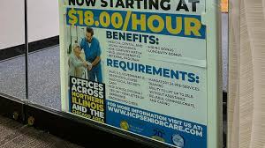 US applications for jobless benefits, a proxy for layoffs, tick down to 209,000 last week.
