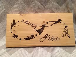 Never Grow Up Wood Sign Peter Pan Infinity Peter Pan Quote Sign Peter Pan Silhouette Disney Silhou Disney Silhouette Wood Burned Signs Wood Burning Art