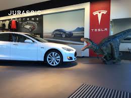 riley stopped by tesla today she was happy to find out tesla is all about 0 emissions no more burning up dinos velociraptor dinosaur jurassic world jurassic riley stopped by tesla today she was