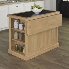 For our kitchen renovation, buying a kitchen island was out of our budget so we decided to build a kitchen island! Home Styles Brown Midcentury Kitchen Islands Lowes Com Kitchen Island With Granite Top Home Styles Eclectic Kitchen