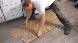 It is also applicable for wet areas including bathrooms and kitchens. How To Install Vinyl Plank Flooring Snap Together Youtube