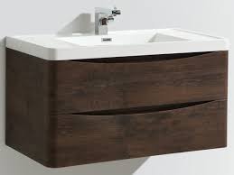 To create a feeling of space, installing a wall hung vanity unit keeps the floor visible and free from clutter. Bali Chestnut 900mm Wall Mounted Vanity Unit With Basin