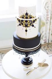 Art Deco Black And Gold Drip Cake Black Gold White Art Deco Hollywood Glam Wedding Cake On Black Cake Stand See More Here Http Www Opulentt Art Deco Cake Art Deco Wedding Cake Gatsby Cake