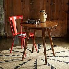 Browse our selection of mid century & modern dining tables to bring effortless style with beautiful furniture & decor. Mid Century Bistro Table Dining Room Furniture Modern Mid Century Round Dining Table Modern Dining Table