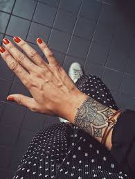 Large tattoo designs gallery showcasing unique flower tattoos, pictures and ideas. Mandalas Mandalatattoo Bracelet Dotworktattoo Mandala Wrist Tattoo Cuff Tattoo Tattoos