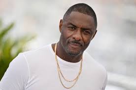 idris elba white shirt