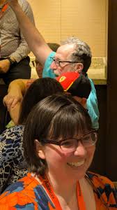 Let the games begin. Peggy Zurcher knows how to bring a group to life!  Having a blast!