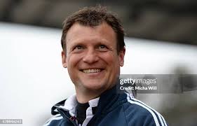 Michael Hefele of Burghausen reacts after beeing booked yellow card... News  Photo