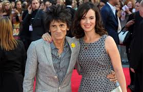 Ronnie wood and sally wood pose with twins alice and gracie. Ronnie Wood Kept Positive Throughout Cancer Battle Entertainment Kpcnews Com