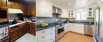 Craftsman kitchen with raised panel cabinets, white marble counters and wood floors. East Bay White Craftsman Kitchen Ruth Preucel Interiors