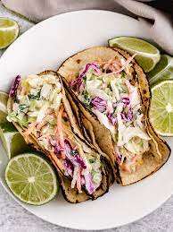 Top tortillas with the fish, jicama, the avocado sauce, sliced chile (or jalapeño) and cilantro. Mahi Mahi Tacos With Slaw Berly S Kitchen