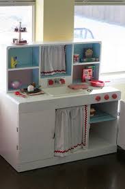 This Is The Kitchen That I Found For 15 At Goodwill This Fall And Refinished For Clare For Christmas It Was Diy Play Kitchen Tent Kids Room Kids Play Kitchen