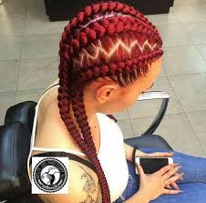 Get your hair on fleek with our best weave hairstyles & african american hairstyles featuring virgin hair sew in weave, brazilian hair, malayasian hair, loose wave hair, body wave, indian hair, curly weaves, sew in weave, virgin hair. Woman Sitting On A Chair With Red Hair Wearing Jeans White Top Braiding Styles With Weave Hair Styles Braided Hairstyles Natural Hair Styles