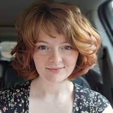 What is the name of the female villain in a kids movie who is a ninja and  has curly hair and spider-like instincts?