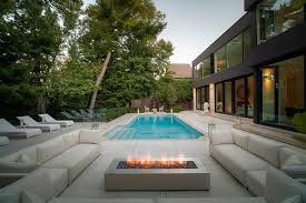 Many modern outside fireplaces feature multiple fire color choices, which you can use if you're tired of a fire look. Investing In An Outside Fireplace Landscape Urban Design