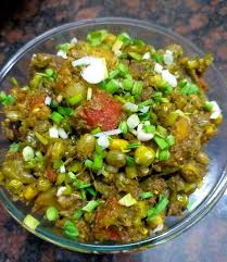 Green Masala Undhiyu - Undhiyu with a green coriander and chili masala, featuring seasonal vegetables