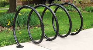 A bike rack may be free standing or it may be securely attached to the ground or some stationary object such as a building. Bike Coil Bike Racks Bike Rack Bicycle Rack Bicycle Storage