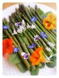 Cooking With Flowers Spring Asparagus Steamed Over A Vegetable Soup And Eating Flowers Edible Flowers Flower Food Edible Bouquets