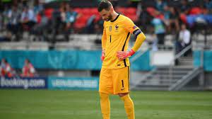 Hungary's peter gulacsi celebrates at the final whistle as france's raphael varane and corentin tolisso look full time: Jiqrfoo60tzv9m