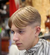 Use your scissors to cut from your forehead to the crown of your head until your hair is roughly 7 or 8 inches (18 or 20 cm) long. Undercut Curtain Hairstyle Men Novocom Top
