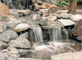 The buried reservoir is disguised with a covering of rocks, and the water simply disappears from view among the stones. How To Build A Pondless Waterfall Pondless Water Feature