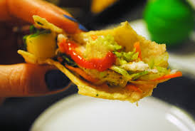 Place the tortilla on the gas ring and then place it on the rolling pin. Wasabi Mango Fish Tacos Recipe