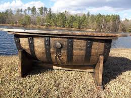 Manlier Than The Manliest Whiskey Barrel Coffee Table Ever Jack Daniels Style Barrel Table Whiskey Barrel Table Whiskey Barrel Coffee Table